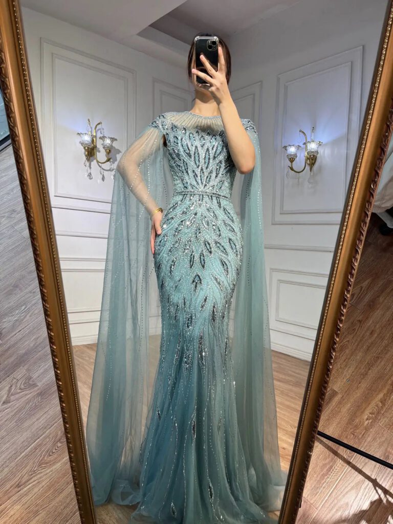 Nove Dress blauw mermaid avondjurk met cape mouwen in Arabische stijl