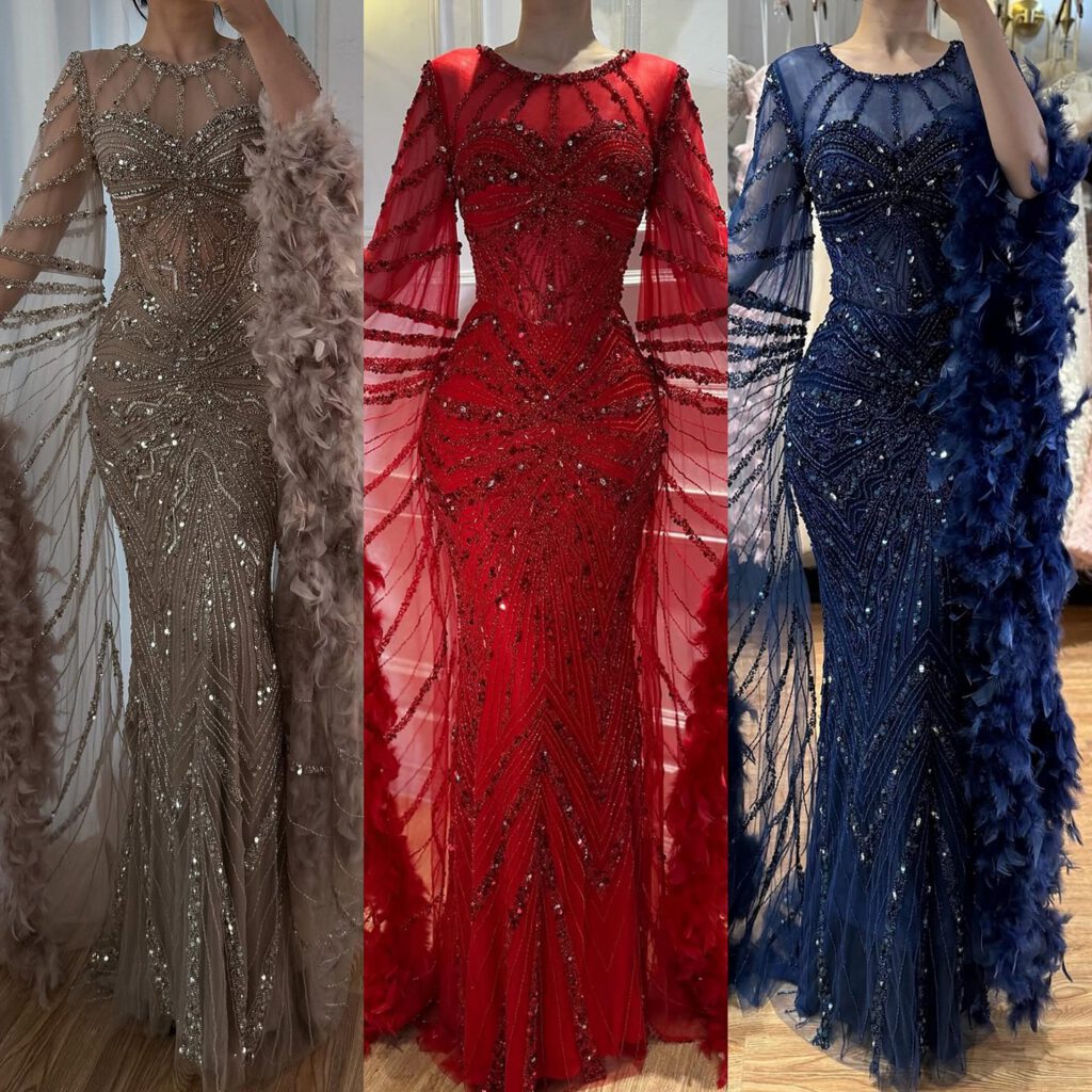 Nove Dress فستان سهرة وردي حورية البحر ريش أكمام كيب محتشم