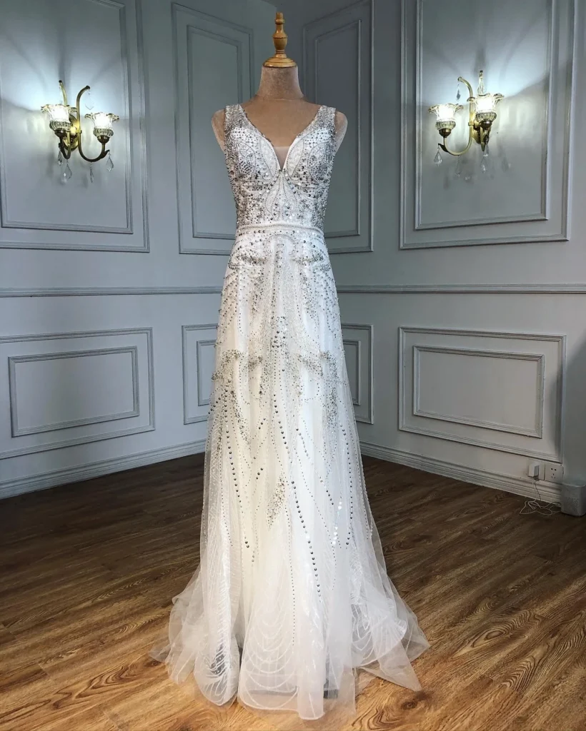 Nove Dress roségold A-Linie Abendkleid mit Perlenbesatz, V-Ausschnitt und ärmellosem Schnitt