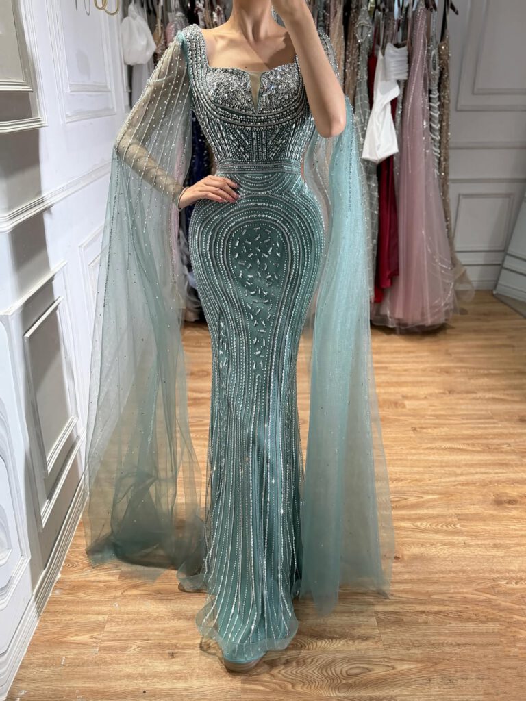 Nove Dress türkis Meerjungfrau Abendkleid mit Perlenstickerei und Cape-Ärmeln